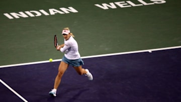 INDIAN WELLS, CALIFORNIA - MARCH 12: Angelique Kerber of Germany plays a backhand against Aryna Sabalenka of Belarusplays a hand during their women's singles fourth round match on day nine of the BNP Paribas Open at the Indian Wells Tennis Garden on March 12, 2019 in Indian Wells, California. (Photo by Sean M. Haffey/Getty Images)