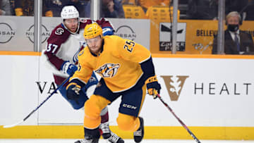 May 7, 2022; Nashville, Tennessee, USA; Nashville Predators right wing Mathieu Olivier (25) skates the puck into the offensive zone during the first period against the Colorado Avalanche in game three of the first round of the 2022 Stanley Cup Playoffs at Bridgestone Arena. Mandatory Credit: Christopher Hanewinckel-USA TODAY Sports