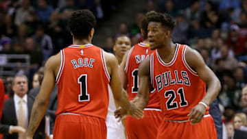 MILWAUKEE, WI - APRIL 30: Jimmy Butler #21 of the Chicago Bulls celebrates with Derrick Rose #1 after shooting a three pointer in the first quarter against the Milwaukee Bucks in the first round of the 2015 NBA Playoffs at the BMO Harris Bradley Center on April 30, 2015 in Milwaukee, Wisconsin. NOTE TO USER: User expressly acknowledges and agrees that, by downloading and or using the photograph, User is consenting to the terms and conditions of the Getty Images License Agreement. (Photo by Mike McGinnis/Getty Images)