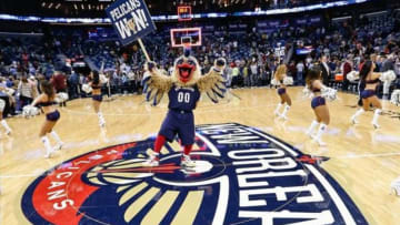 Nov 2, 2013; New Orleans, LA, USA; The New Orleans Pelicans mascot Pierre the Pelican and the Pelicans dance team celebrate following a win over the Charlotte Bobcats at New Orleans Arena. The Pelicans defeated the Bobcats 105-84. Mandatory Credit: Derick E. Hingle-USA TODAY Sports