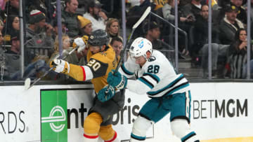 Nov 15, 2022; Las Vegas, Nevada, USA; San Jose Sharks right wing Timo Meier (28) checks Vegas Golden Knights center Chandler Stephenson (20) off the puck during the first period at T-Mobile Arena. Mandatory Credit: Stephen R. Sylvanie-USA TODAY Sports