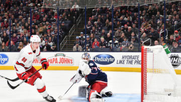 COLUMBUS, OH - JANUARY 16: Martin Necas #88 of the Carolina Hurricanes scores on goaltender Elvis Merzlikins #90 of the Columbus Blue Jackets during the second period of a game on January 16, 2020 at Nationwide Arena in Columbus, Ohio. (Photo by Jamie Sabau/NHLI via Getty Images)