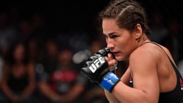 SINGAPORE - JUNE 23: Jessica Eye battles Jessica-Rose Clark (not pictured) of Australia in their women's flyweight bout during the UFC Fight Night event at the Singapore Indoor Stadium on June 23, 2018 in Singapore. (Photo by Jeff Bottari/Zuffa LLC/Zuffa LLC via Getty Images)