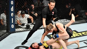 LAS VEGAS, NEVADA - DECEMBER 14: (R-L) Irene Aldana of Mexico finishes Ketlen Vieira of Brazil in their women's bantamweight bout during the UFC 245 event at T-Mobile Arena on December 14, 2019 in Las Vegas, Nevada. (Photo by Jeff Bottari/Zuffa LLC)