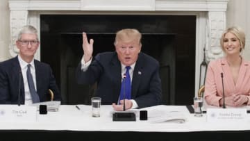 WASHINGTON, DC - MARCH 06: U.S. President Donald Trump delivers remarks as Apple CEO Tim Cook and Ivanka Trump look on during a meeting with the American Workforce Policy Advisory Board inside the State Dining Room on March 6, 2019 in Washington, DC. The board, co-chaired by Ivanka and Commerce Secretary Wilbur Ross, is tasked with developing a strategy to revamp the U.S. workforce for well-paid, in-demand jobs and with promoting private-sector investments in workers. (Photo by Tom Brenner/Getty Images)
