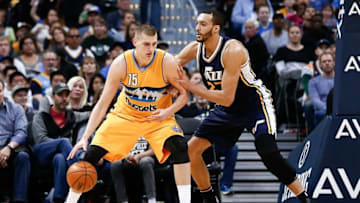 Apr 10, 2016; Denver, CO, USA; Utah Jazz center Rudy Gobert (27) defends against Denver Nuggets center Nikola Jokic (15) in the second quarter at the Pepsi Center. Mandatory Credit: Isaiah J. Downing-USA TODAY Sports