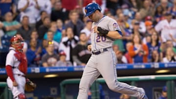 Apr 20, 2016; Philadelphia, PA, USA; New York Mets second baseman Neil Walker (20) scores during the second inning against the Philadelphia Phillies at Citizens Bank Park. Mandatory Credit: Bill Streicher-USA TODAY Sports