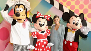 ANAHEIM, CA - MAY 18: (EDITORS NOTE: Retransmission with alternate crop.) Goofy, Minnie Mouse and Mickey Mouse join actor Vanessa Hudgens to celebrate the opening of Black Tap Craft Burgers & Shakes, May 18, 2019, in the Downtown Disney District at Disneyland Resort in Anaheim, Calif. (Photo by Jesse Grant/Getty Images for Black Tap Craft Burgers and Shakes)