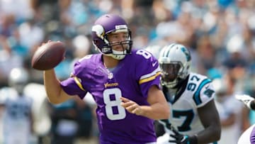 Sep 25, 2016; Charlotte, NC, USA; Minnesota Vikings quarterback Sam Bradford (8) drops back to pass during the first half against the Carolina Panthers at Bank of America Stadium. Mandatory Credit: Jeremy Brevard-USA TODAY Sports