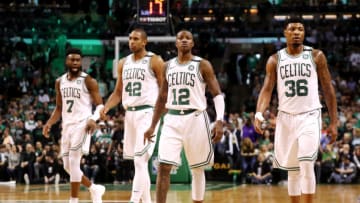 BOSTON, MA - MAY 13: Jaylen Brown #7, Al Horford #42, Terry Rozier #12 and Marcus Smart #36 of the Boston Celtics walk back on the court after a timeout against the Cleveland Cavaliers during the second quarter in Game One of the Eastern Conference Finals of the 2018 NBA Playoffs at TD Garden on May 13, 2018 in Boston, Massachusetts. (Photo by Maddie Meyer/Getty Images)
