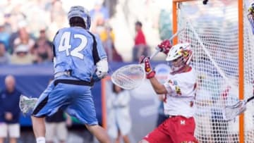 May 23, 2015; Philadelphia, PA, USA; Maryland Terrapins goalie Kyle Bernlohr (35) makes a save on Johns Hopkins Blue Jays attacker Wells Stanwick (42) during the fourth quarter in the semifinals of the NCAA division I men