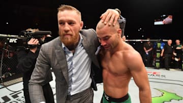 BELFAST, NORTHERN IRELAND - NOVEMBER 19: (L-R) Artem Lobov of Russia celebrates with teammate and UFC champion Conor McGregor after his featherweight bout against Teruto Ishihara during the UFC Fight Night at the SSE Arena on November 19, 2016 in Belfast, Northern Ireland. Lobov defeated Ishihara by unanimous-decision. (Photo by Brandon Magnus/Zuffa LLC/Zuffa LLC via Getty Images)