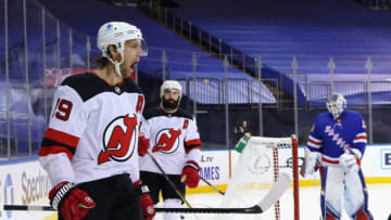 NEW YORK, NEW YORK - JANUARY 19: Travis Zajac #19 of the New Jersey Devils celebrates his goal against the New York Rangers at 32 seconds of the first period at Madison Square Garden on January 19, 2021 in New York City. (Photo by Bruce Bennett/Getty Images)