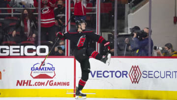 Mar 27, 2021; Raleigh, North Carolina, USA; Carolina Hurricanes center Martin Necas (88) celebrates his second period goal against the Tampa Bay Lightning at PNC Arena. Mandatory Credit: James Guillory-USA TODAY Sports