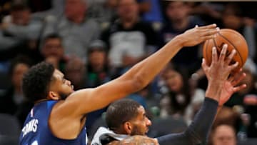 SAN ANTONIO,TX - DECEMBER 21: Karl-Anthony Towns of the Minnesota Timberwolves blocks San Antonio Spurs' LaMarcus Aldridge's shot. (Photo by Ronald Cortes/Getty Images)