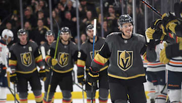 LAS VEGAS, NEVADA - FEBRUARY 26: Nick Cousins #21 of the Vegas Golden Knights celebrates with teammates on the bench after scoring a third-period power-play goal against the Edmonton Oilers during their game at T-Mobile Arena on February 26, 2020 in Las Vegas, Nevada. The Golden Knights defeated the Oilers 3-0. (Photo by Ethan Miller/Getty Images)