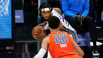 Marvin Bagley III #35 of the Sacramento Kings looks to move the ball past Isaiah Roby #22 of the Oklahoma City Thunder during the game at Golden 1 Center on May 9, 2021 in Sacramento, California. NOTE TO USER: User expressly acknowledges and agrees that, by downloading and or using this photograph, User is consenting to the terms and conditions of the Getty Images License Agreement. (Photo by Ben Green/Getty Images)