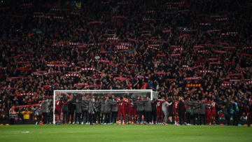 LIVERPOOL, ENGLAND - MAY 07: Liverpool players celebrate with fans after the UEFA Champions League Semi Final second leg match between Liverpool and Barcelona at Anfield on May 07, 2019 in Liverpool, England. (Photo by Shaun Botterill/Getty Images)