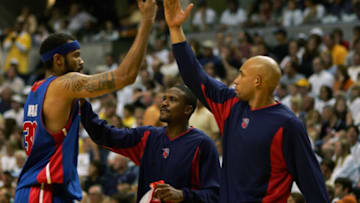 INDIANAPOLIS - MAY 30: Rasheed Wallace #30 high fives teammates Lindsey Hunter #10 and Darvin Ham #8 of the Detroit Pistons (Photo by Ezra Shaw/Getty Images)