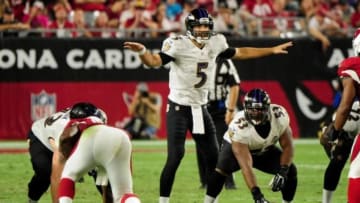 Oct 26, 2015; Glendale, AZ, USA; Baltimore Ravens quarterback Joe Flacco (5) signals to teammates prior to the snap during the second half against the Arizona Cardinals at University of Phoenix Stadium. Mandatory Credit: Matt Kartozian-USA TODAY Sports