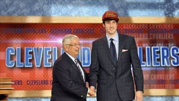 Jun 27, 2013; Brooklyn, NY, USA; Sergey Karasev poses with NBA commissioner David Stern after being selected as the number nineteen overall pick to the Cleveland Cavaliers during the 2013 NBA Draft at the Barclays Center. Mandatory Credit: Joe Camporeale-USA TODAY Sports