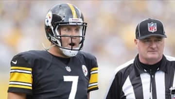 Sep 8, 2013; Pittsburgh, PA, USA; Pittsburgh Steelers quarterback Ben Roethlisberger (7) reacts after after looking for a pass interference call against the Tennessee Titans during the fourth quarter at Heinz Field. The Tennessee Titans won 16-9. Mandatory Credit: Charles LeClaire-USA TODAY Sports