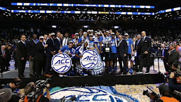 NEW YORK, NY - MARCH 11: The Duke Blue Devils hold up the trophy after defeating the Notre Dame Fighting Irish 75-69 in the championship game of the 2017 Men's ACC Basketball Tournament at the Barclays Center on March 11, 2017 in New York City. (Photo by Al Bello/Getty Images)