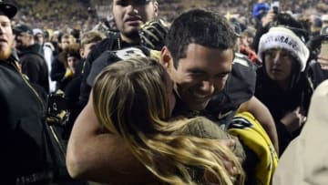 Nov 26, 2016; Boulder, CO, USA; Colorado Buffaloes quarterback Sefo Liufau (13) celebrates the win over the Utah Utes at Folsom Field. The Buffaloes defeated the Utes 27-22. Mandatory Credit: Ron Chenoy-USA TODAY Sports
