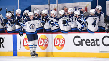 Logan Stanley #64, Winnipeg Jets (Photo by Minas Panagiotakis/Getty Images)