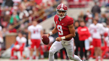 TUSCALOOSA, ALABAMA - NOVEMBER 19: Bryce Young #9 of the Alabama Crimson Tide rolls out of the pocket as he looks to pass against the Austin Peay Governors during the second half at Bryant-Denny Stadium on November 19, 2022 in Tuscaloosa, Alabama. (Photo by Kevin C. Cox/Getty Images)
