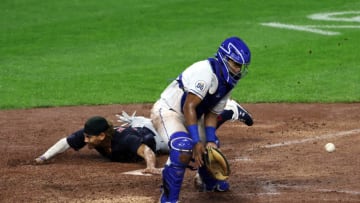 KANSAS CITY, MISSOURI - SEPTEMBER 01: Josh Naylor #31 of the Cleveland Indians slides safely into home to score as catcher Meibrys Viloria #72 of the Kansas City Royals misses the ball during the 7th inning of the game at Kauffman Stadium on September 01, 2020 in Kansas City, Missouri. (Photo by Jamie Squire/Getty Images)