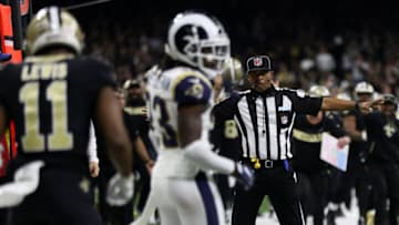 NEW ORLEANS, LOUISIANA - JANUARY 20: A referee watches as Tommylee Lewis #11 of the New Orleans Saints drops a pass broken up by Nickell Robey-Coleman #23 of the Los Angeles Rams during the fourth quarter in the NFC Championship game at the Mercedes-Benz Superdome on January 20, 2019 in New Orleans, Louisiana. at Mercedes-Benz Superdome on January 20, 2019 in New Orleans, Louisiana.