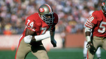 San Francisco defensive end Fred Dean (74) rushes from the right side. (Photo by Arthur Anderson/Getty Images) *** Local Caption ***