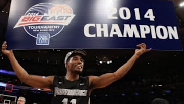 Mar 15, 2014; New York, NY, USA; Providence Friars guard Bryce Cotton (11) celebrates after defeating the Providence Friars to win the championship game of the Big East college basketball tournament at Madison Square Garden. Mandatory Credit: Adam Hunger-USA TODAY Sports