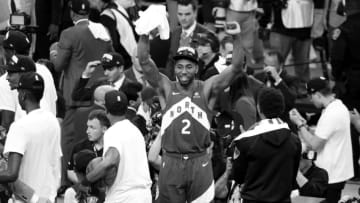 OAKLAND, CA - JUNE 13: (EDITORS NOTE this image has been converted to black and white) Kawhi Leonard #2 of the Toronto Raptors celebrates after the Toronto Raptors win the game and become the 2019 NBA Champions in Game Six of the NBA Finals on June 13, 2019 at ORACLE Arena in Oakland, California. NOTE TO USER: User expressly acknowledges and agrees that, by downloading and/or using this photograph, user is consenting to the terms and conditions of Getty Images License Agreement. Mandatory Copyright Notice: Copyright 2019 NBAE (Photo by Joe Murphy/NBAE via Getty Images)