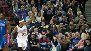 Nov 15, 2013; Sacramento, CA, USA; Sacramento Kings point guard Isaiah Thomas (22) points to the crowd after making a three pointer against the Detroit Pistons during the second quarter at Sleep Train Arena. Mandatory Credit: Ed Szczepanski-USA TODAY Sports