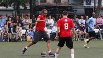 Jun 26, 2013; New York, NY, USA; Joakim Noah (4) of the Chicago Bulls and Team USA plays the ball during the Steve Nash Foundation Showdown. Mandatory Credit: Andy Marlin-USA TODAY Sports