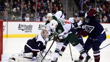 Mar 26, 2016; Denver, CO, USA; Minnesota Wild left wing Zach Parise (11) attempts to score on Colorado Avalanche goalie Semyon Varlamov (1) as defenseman Erik Johnson (6) defends from behind in the third period at the Pepsi Center. The Wild defeated the Avalanche 4-0. Mandatory Credit: Ron Chenoy-USA TODAY Sports