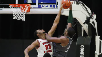 Western Kentucky Hilltoppers center Charles Bassey (23) blocks a shot by UAB Blazers center Trey Jemison (55)(Tim Heitman-USA TODAY Sports)