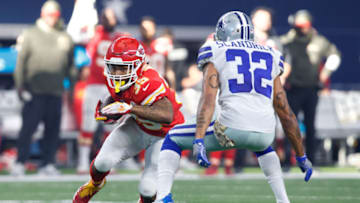 ARLINGTON, TX - NOVEMBER 05: Kansas City Chiefs running back Charcandrick West (#35) looks for room to run as Dallas Cowboys cornerback Orlando Scandrick (#32) closes in during the NFL football game between the Dallas Cowboys and the Kansas City Chiefs on November 5, 2017 at AT&T Stadium in Arlington, Texas. (Photo by Matthew Visinsky/Icon Sportswire via Getty Images)