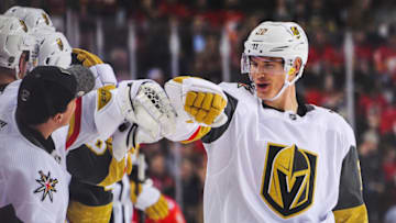 CALGARY, AB - MARCH 8: Nick Holden #22 of the Vegas Golden Knights celebrates with the bench after scoring against the Calgary Flames during an NHL game at Scotiabank Saddledome on March 8, 2020 in Calgary, Alberta, Canada. (Photo by Derek Leung/Getty Images)