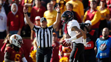 AMES, IA - OCTOBER 27: Wide receiver Antoine Wesley #4 of the Texas Tech Red Raiders celebrates after scoring a touchdown as defensive back De'Monte Ruth #6 of the Iowa State Cyclones watches on in the second half of play at Jack Trice Stadium on October 27, 2018 in Ames, Iowa. The Iowa State Cyclones won 40-31 over the Texas Tech Red Raiders. (Photo by David Purdy/Getty Images)