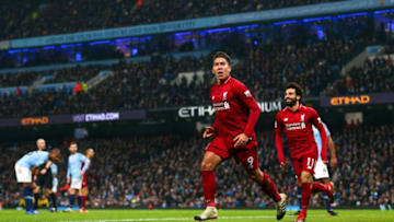 MANCHESTER, ENGLAND - JANUARY 03: Roberto Firmino of Liverpool celebrates after scoring a goal to make it 1-1 during the Premier League match between Manchester City and Liverpool FC at Etihad Stadium on January 3, 2019 in Manchester, United Kingdom. (Photo by Robbie Jay Barratt - AMA/Getty Images)