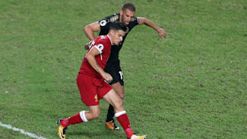 HONG KONG - JULY 22: Philippe Coutinho of Liverpool battles with Islam Slimani of Leicester City of during the Premier League Asia Trophy match between Liverpool FC and Leicester City FC at Hong Kong Stadium on July 22, 2017 in Hong Kong, Hong Kong. (Photo by Stanley Chou/Getty Images )