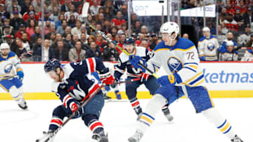 Mar 15, 2023; Washington, District of Columbia, USA; Washington Capitals defenseman Nick Jensen (3) skates with the puck as Buffalo Sabres center Tage Thompson (72) defends in the first period at Capital One Arena. Mandatory Credit: Geoff Burke-USA TODAY Sports