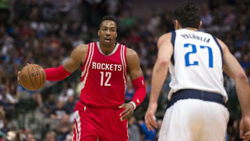 Apr 6, 2016; Dallas, TX, USA; Houston Rockets center Dwight Howard (12) brings the ball up court as Dallas Mavericks center Zaza Pachulia (27) defends during the second half at the American Airlines Center. The Mavericks defeat the Rockets 88-86. Mandatory Credit: Jerome Miron-USA TODAY Sports