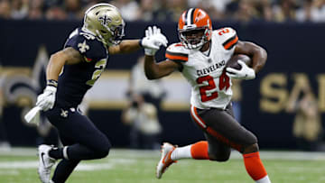 NEW ORLEANS, LA - SEPTEMBER 16: Nick Chubb #24 of the Cleveland Browns runs with the ball as Kurt Coleman #29 of the New Orleans Saints defends during a game at the Mercedes-Benz Superdome on September 16, 2018 in New Orleans, Louisiana. (Photo by Jonathan Bachman/Getty Images)