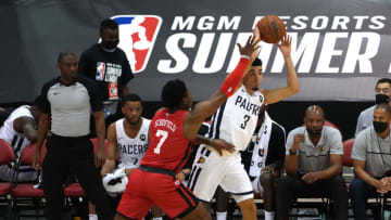 Aug 10, 2021; Las Vegas, Nevada, USA; Indiana Pacers guard Chris Duarte (3) looks to pass the ball as Atlanta Hawks forward Admiral Schofield (7) defends during an NBA Summer League game at Cox Pavilion. Mandatory Credit: Stephen R. Sylvanie-USA TODAY Sports