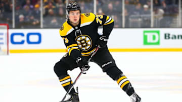 BOSTON, MA - FEBRUARY 04: Charlie McAvoy #73 of the Boston Bruins skates with the puck during a game against the Vancouver Canucks at TD Garden on February 4, 2020 in Boston, Massachusetts. (Photo by Adam Glanzman/Getty Images)