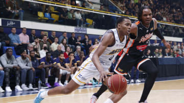 LEVALLOIS-PERRET, FRANCE - MARCH 28: Bilal Coulibaly #0 of Boulogne-Levallois Metropolitans 92 drives to the basket against Josh Carlton #25 of Le Mans Sarthe Basket during the match between Boulogne-Levallois and Le Mans at Palais des Sports Marcel Cerdan on March 28, 2023 in Levallois-Perret, France. (Photo by Catherine Steenkeste/Getty Images)